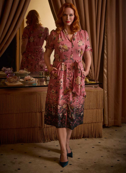 Christina Hendricks X Joanie - Wallflower Chinoiserie Floral Print Midi Tea Dress - Model Front Hand In Pocket